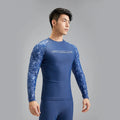 Men's dark blue patterned nylon swimwear set consisting of a top and trousers.