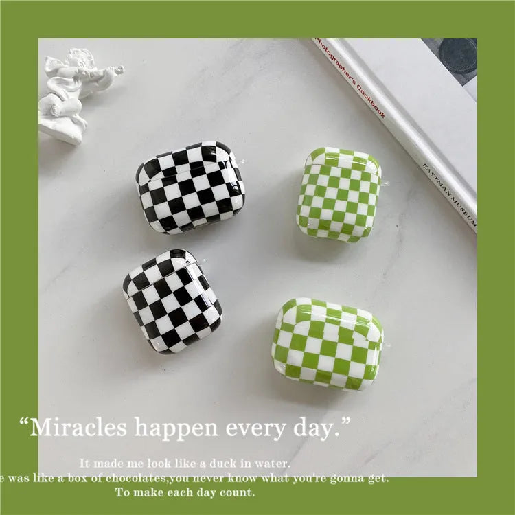 Black and green checkerboard pattern TPU case for Apple AirPods with optional lanyard and pendant accessories.