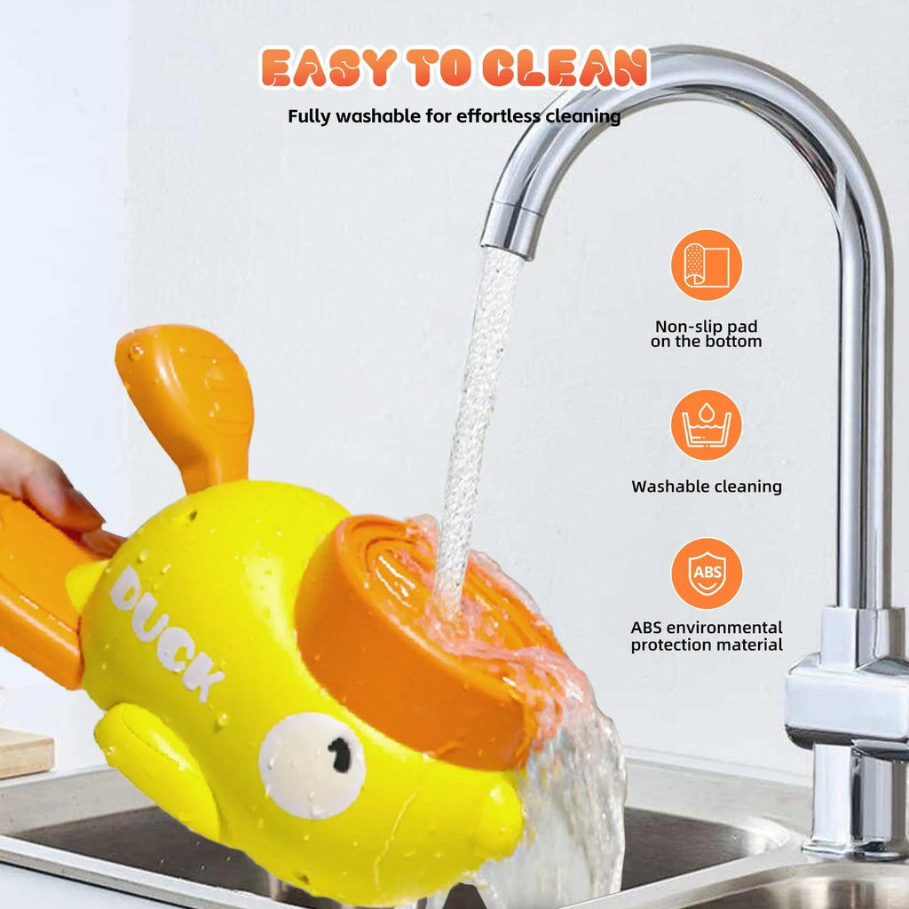 Yellow duck-shaped dog treat dispenser with rotating food container and non-slip base on floor