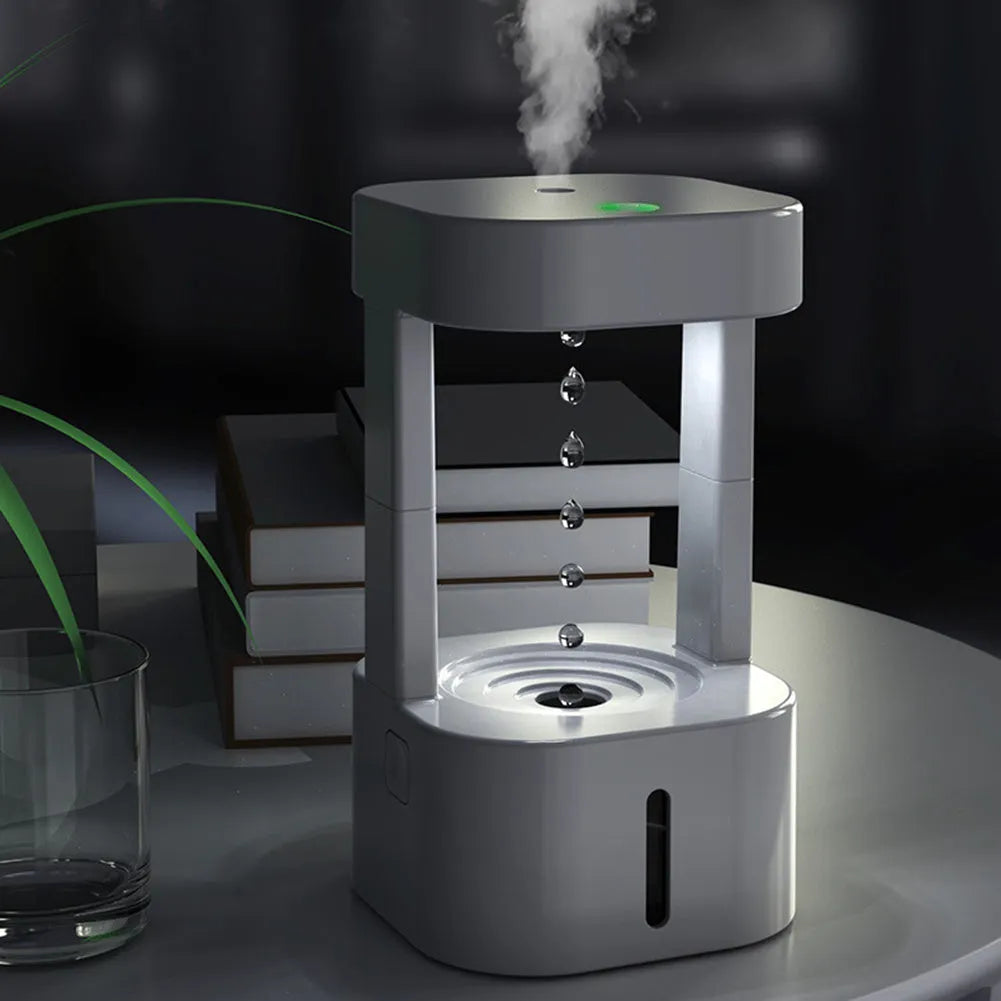 Mini humidifier with anti-gravity water droplets and 580ml tank for bedroom office use
