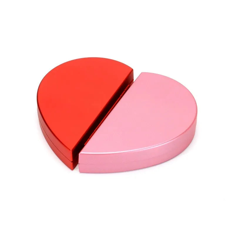 Red 3D heart-shaped plastic ring box with a rotating white rose decoration on top.