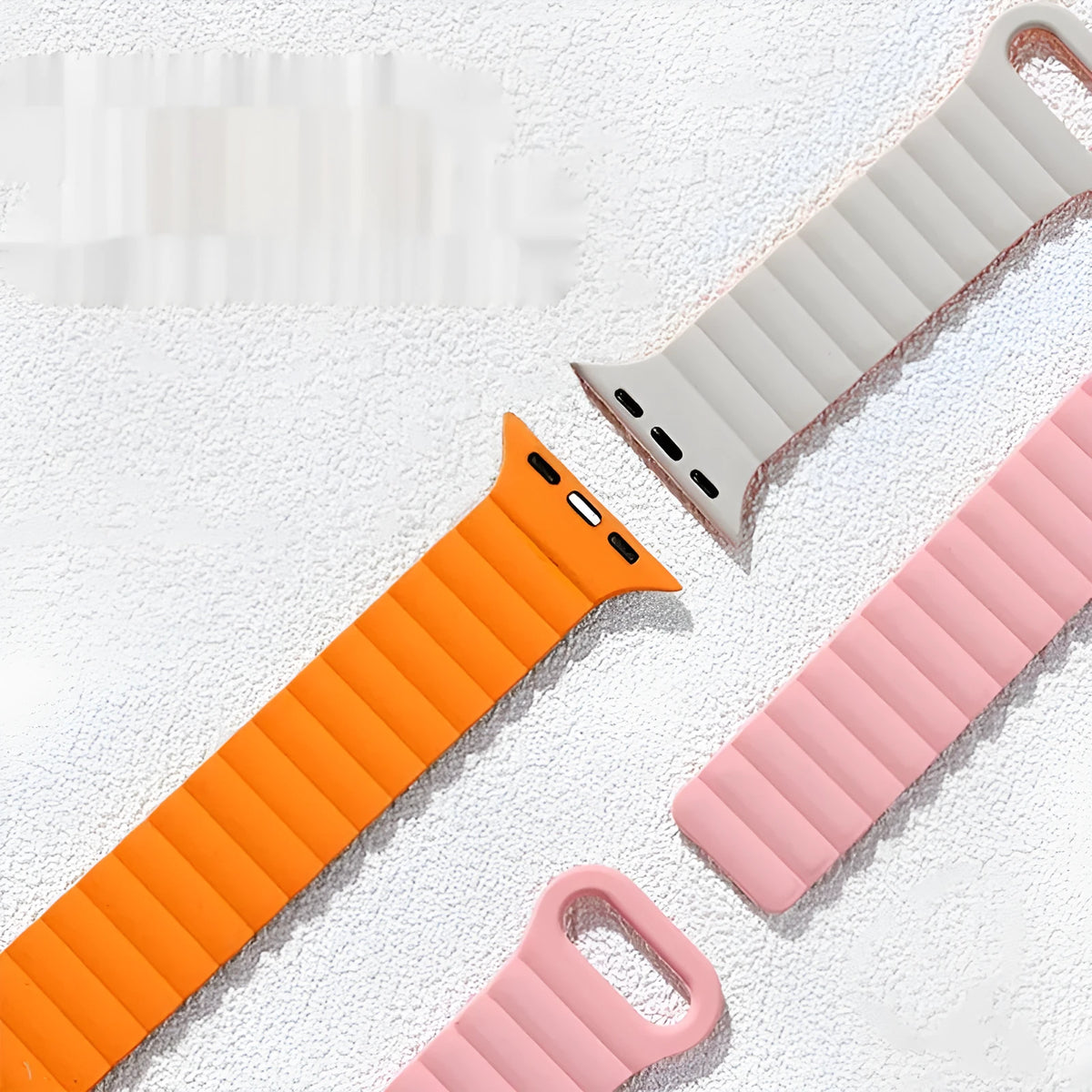 Two-colour silicone magnetic watch band for Apple Watch, sizes 38-49mm, shown in black with orange.