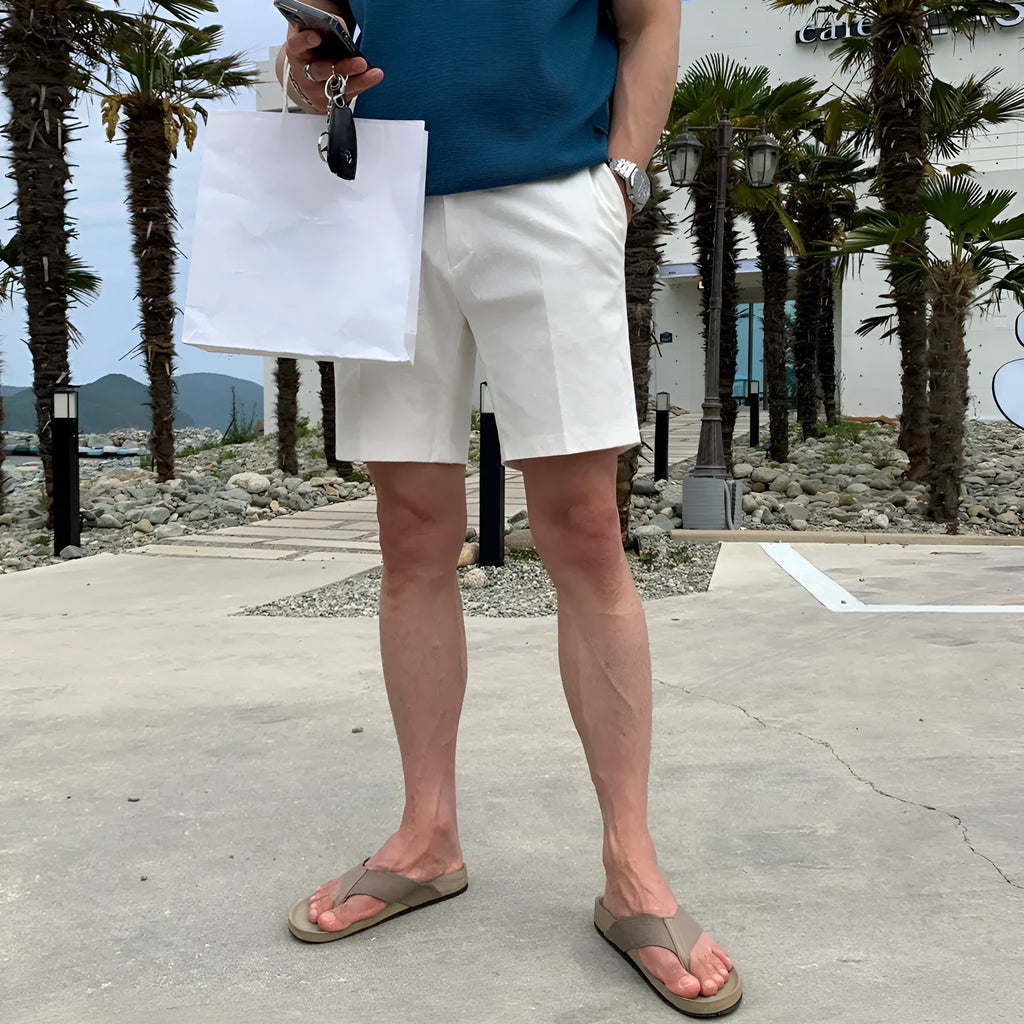 Men's loose straight casual shorts in black, white, and khaki solid colours made from polyester fabric