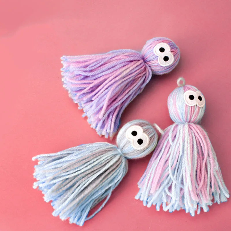 Wool ball cat toy with hanging loop and teaser stick in blue grey colour