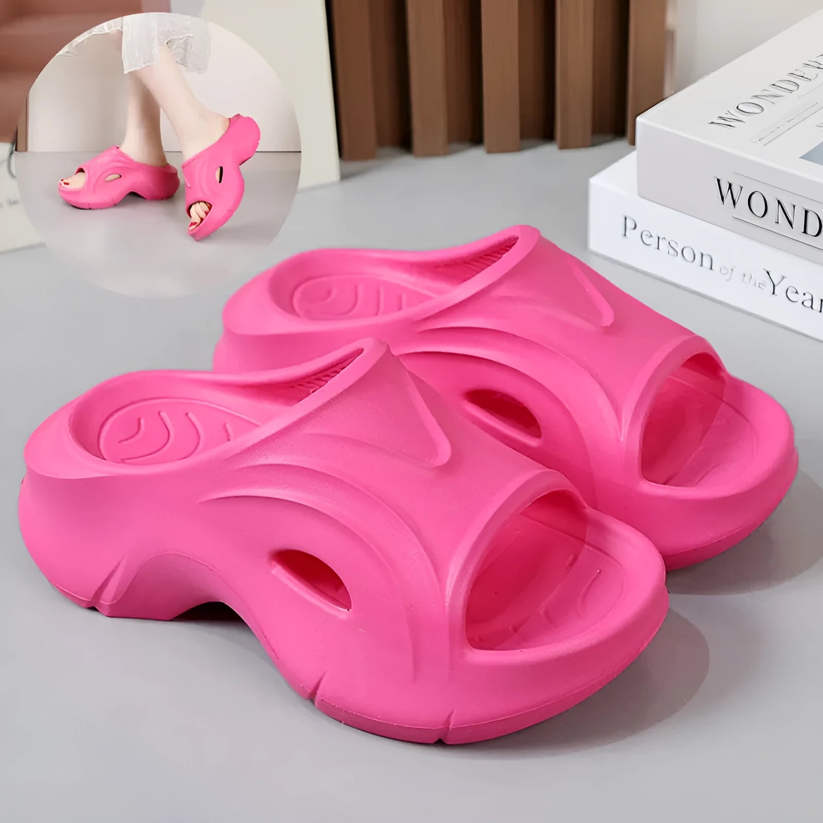 Women's thick-soled EVA beach slippers in rose red colour with round toe design.