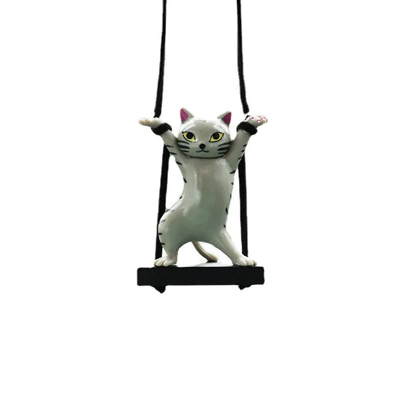 Cartoon-style resin cat pendant for car interior decoration in one of five colour options.