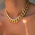 Gold thick chain necklace for women with a 6cm pendant on a 32cm chain.