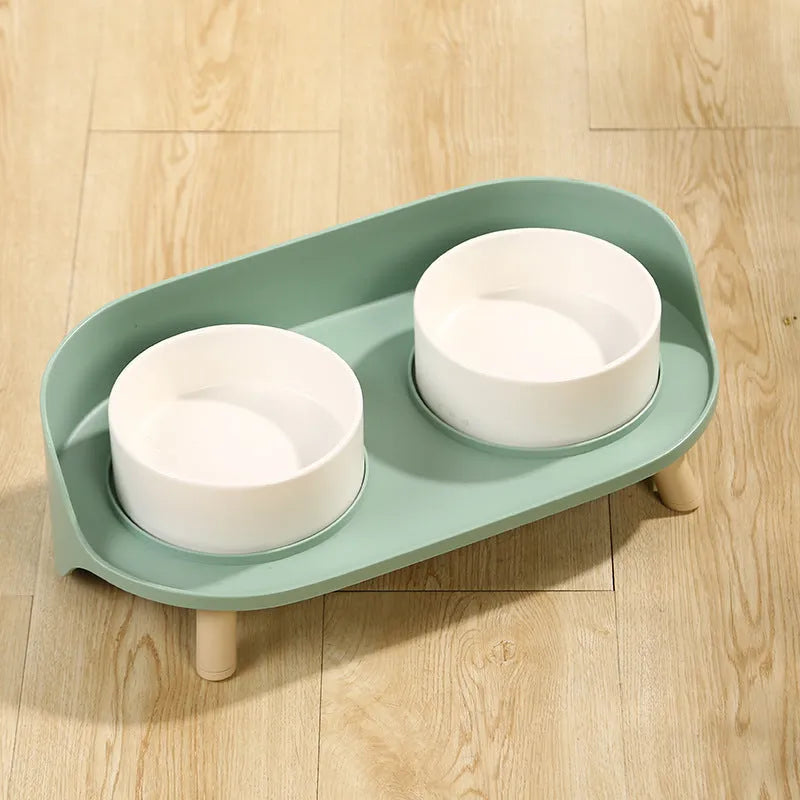 Green adjustable double-bowl pet feeder with tilted design for cervical support