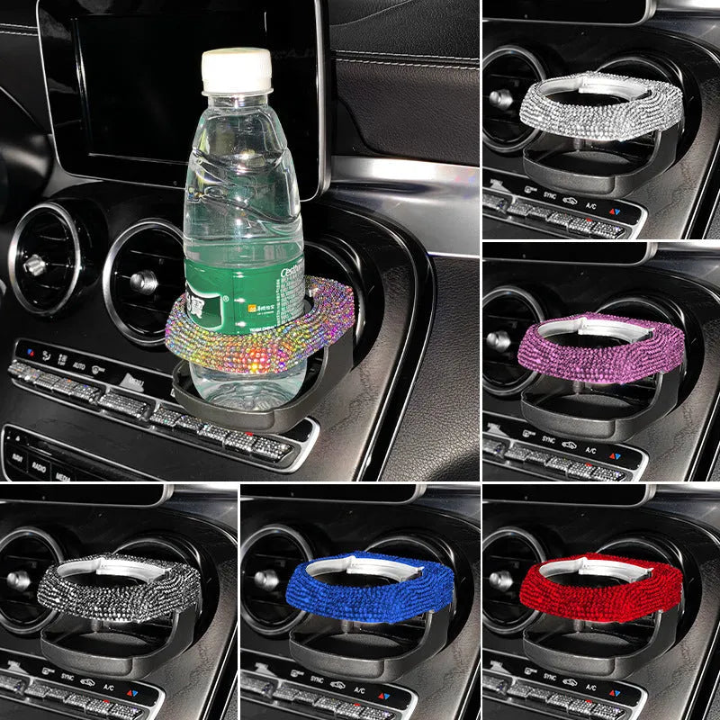 Car interior ashtray bracket with cup holder and rhinestone decoration mounted on air vent.