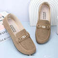 Gommino women's black slip-on casual shoes with a round toe and soft rubber sole on a white background.