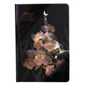 A5 notebook with luminous cover open to show colour illustrated interior pages