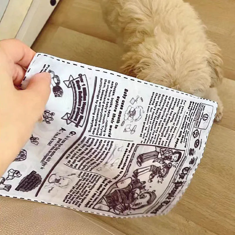 Realistic newspaper texture dog toy that produces squeaking sounds during play