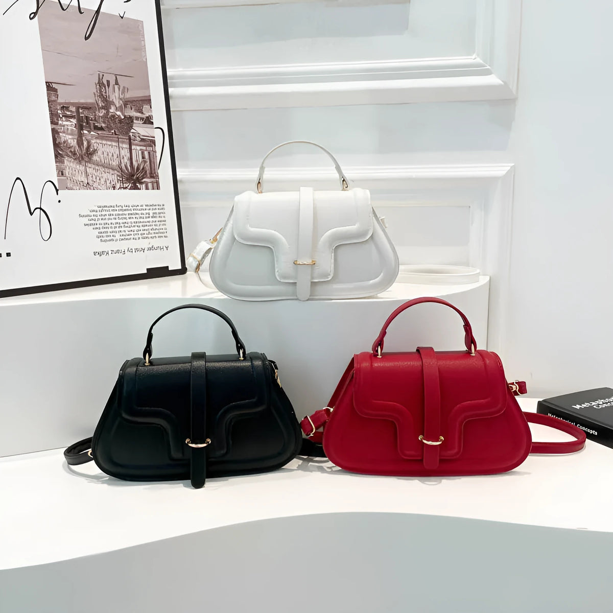 Simple PU shoulder bag in black, white or red with single strap and horizontal square shape.