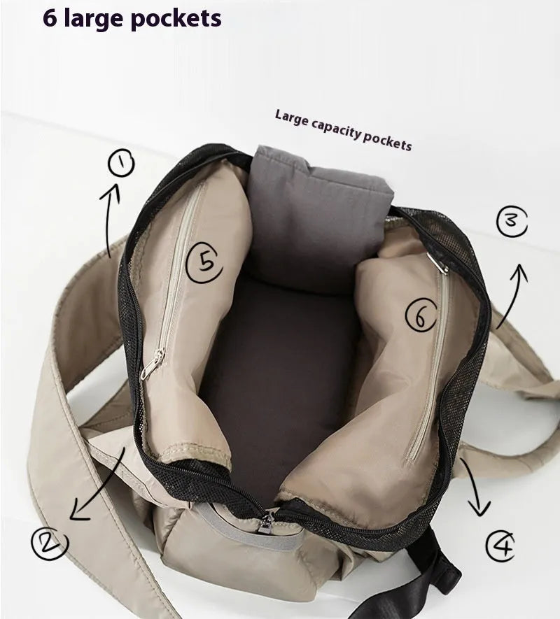Apricot coloured cloth pet carrier handbag showing portable size.