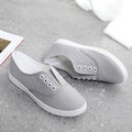 Low-top canvas casual shoes in black, available in sizes 35 to 41 with a flat plastic sole.