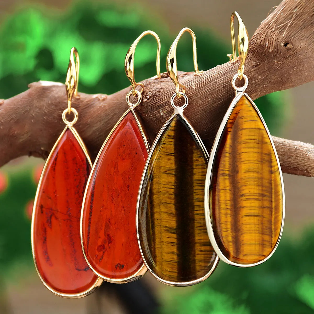 Vintage long drop earrings made from Tigereye stone with water droplets design