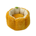 Orange pumpkin-shaped pet bed for cats and small dogs with raised sides and cotton filling