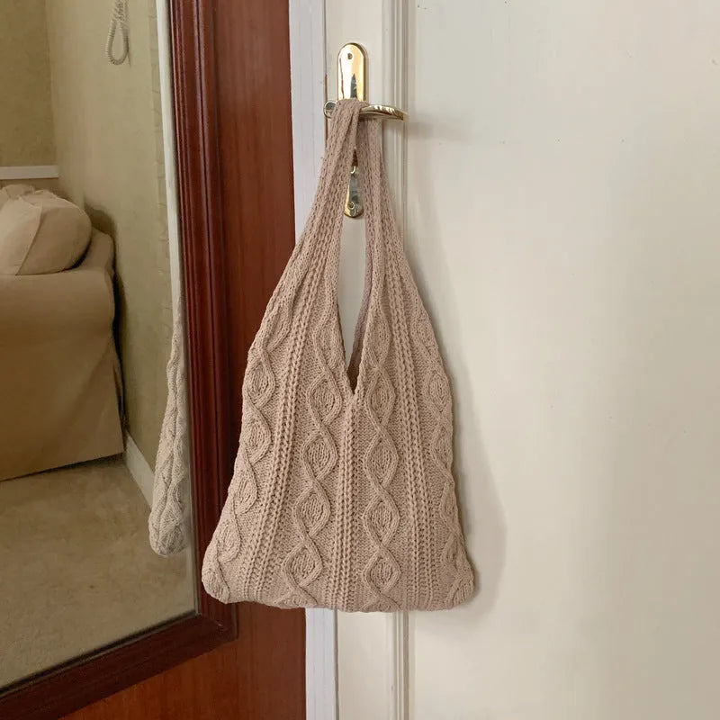 Knitted yarn shoulder tote bag in solid colour with hollow texture and double straps