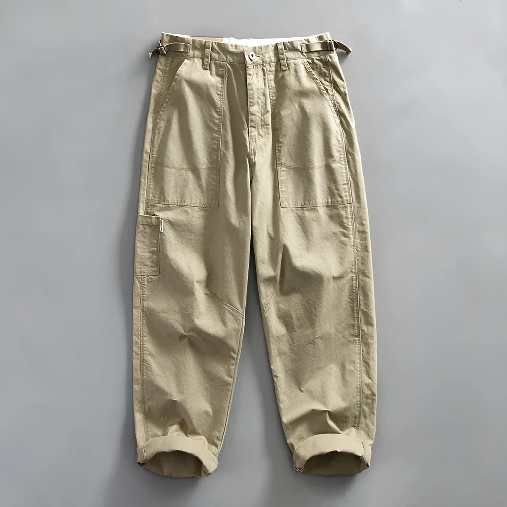 Men's straight-leg cotton casual trousers in apricot, shown flat.