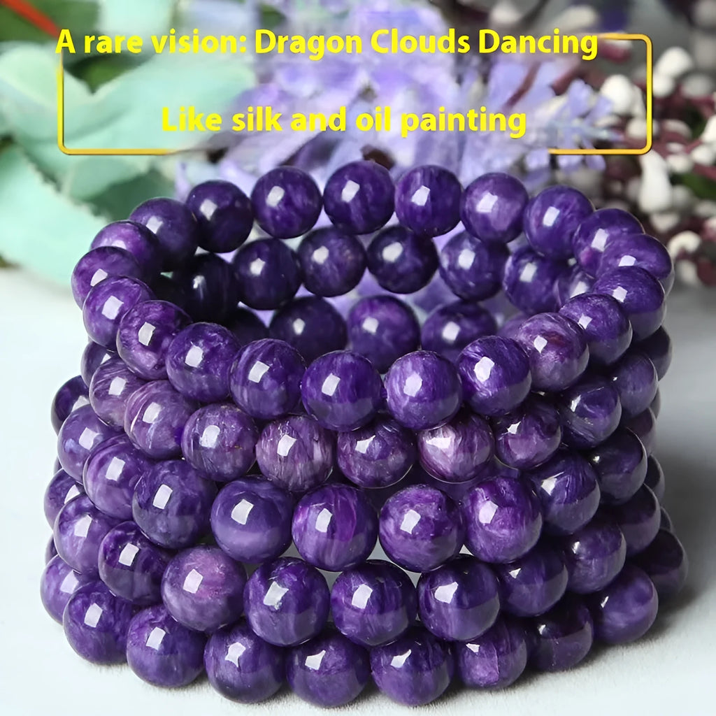 Natural transparent charoite crystal bracelet with platinum metal setting, showing different bead size options.