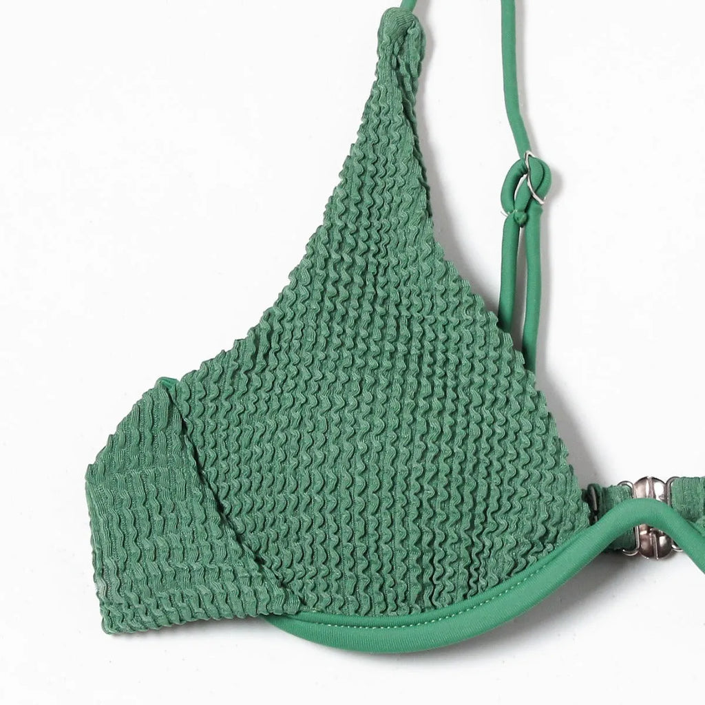 Green women's bikini with ruffle detail on quick-dry polyester fabric.