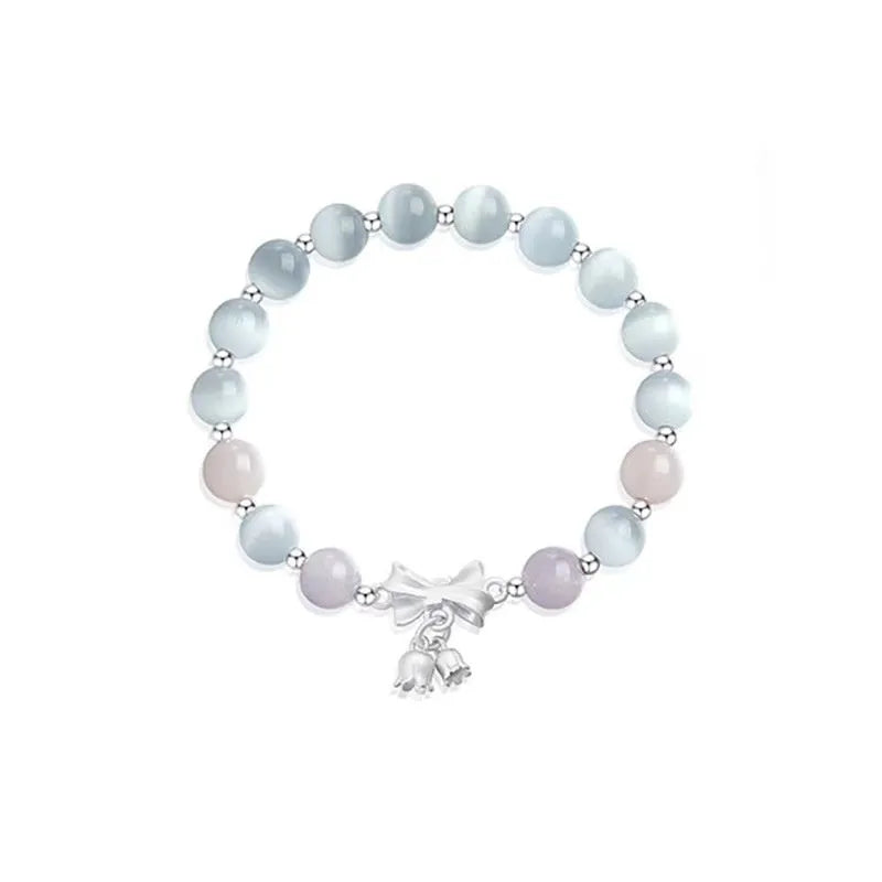 Lavender purple bowknot opal crystal bracelet with electroplated finish for women.