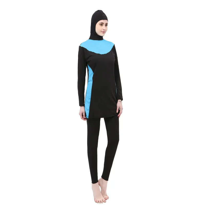Women's black hooded swimsuit with long sleeves and matching pants for swimming
