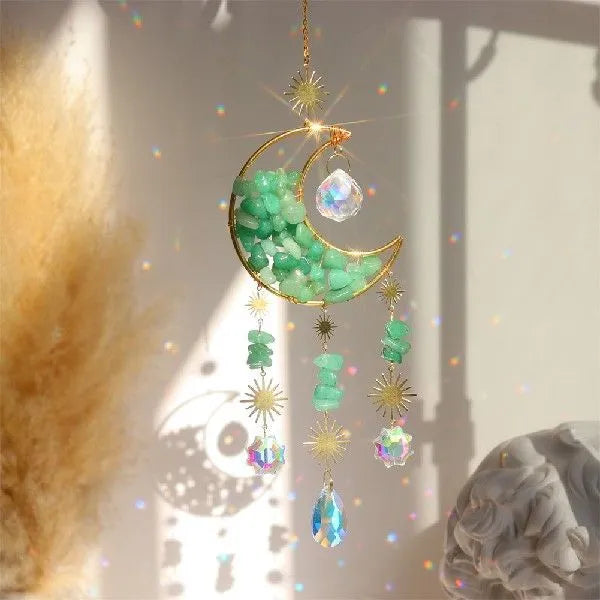 K9 crystal moon-shaped car pendant on a long cable for rear-view mirrors, shown in blue colour.