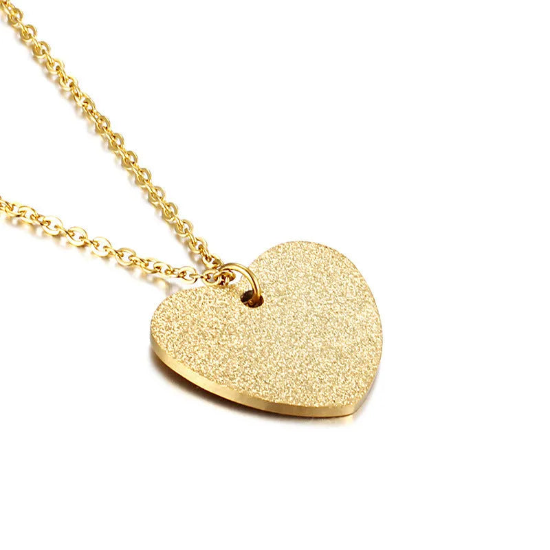 Geometric titanium steel pendant necklace with a heart-shaped neckline design in a metallic finish.
