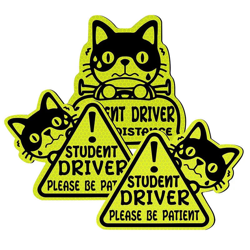 Set of three magnetic reflective car stickers showing cat, panda and duck designs on a car window.