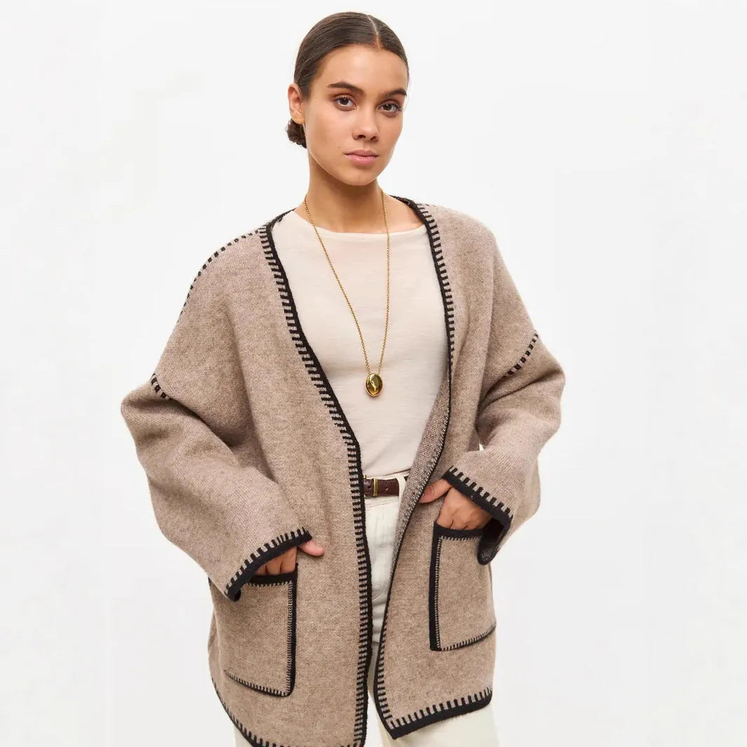 Loose lace-up knitted cardigan sweater coat in camel colour showing front detail