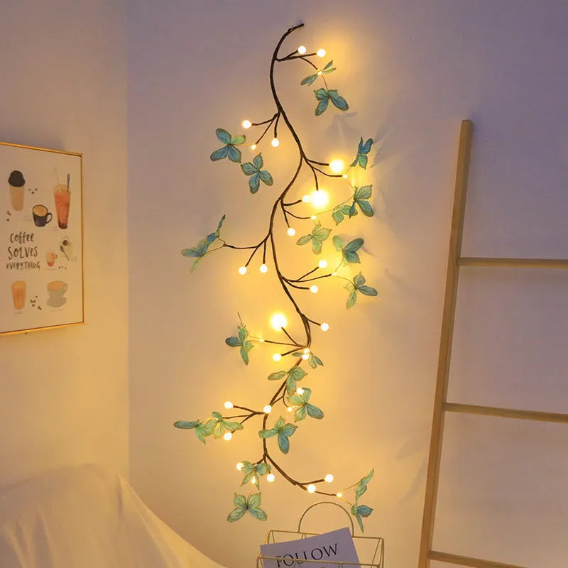 LED butterfly tree rattan lamp with flexible branches and colourised butterfly decorations