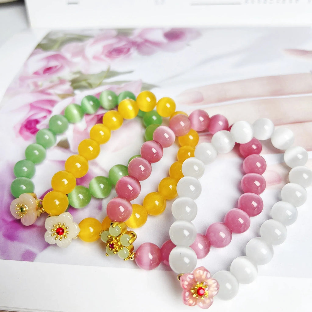 Handmade glass bracelet with floral beads in yellow, pink, white or green colour options