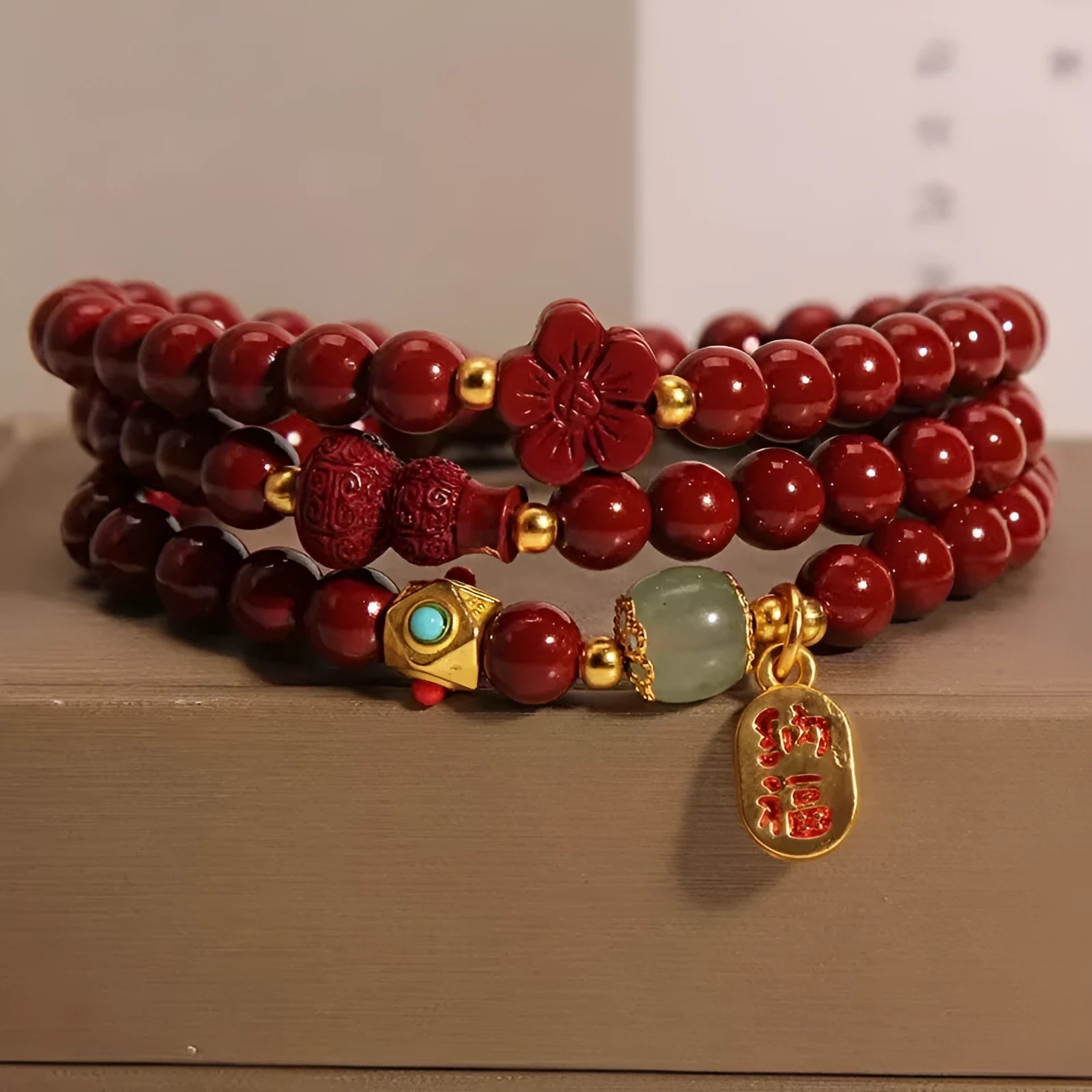 Red cinnabar bracelet with multi-circle gourd and five-petal flower geometric design