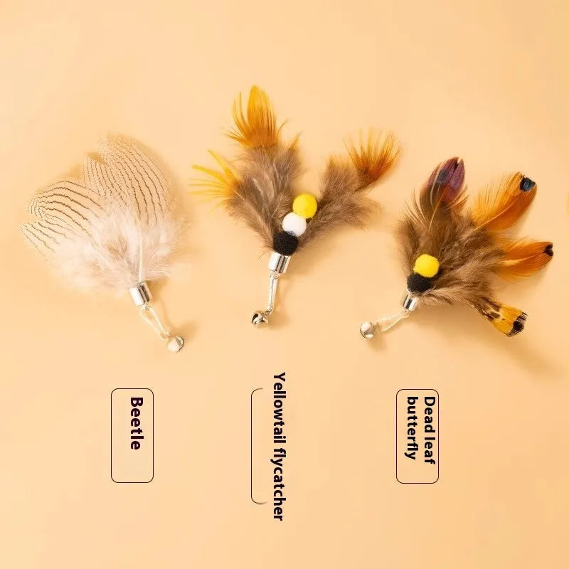 Three steel wire cat toy replacement heads shaped like small flying insects.