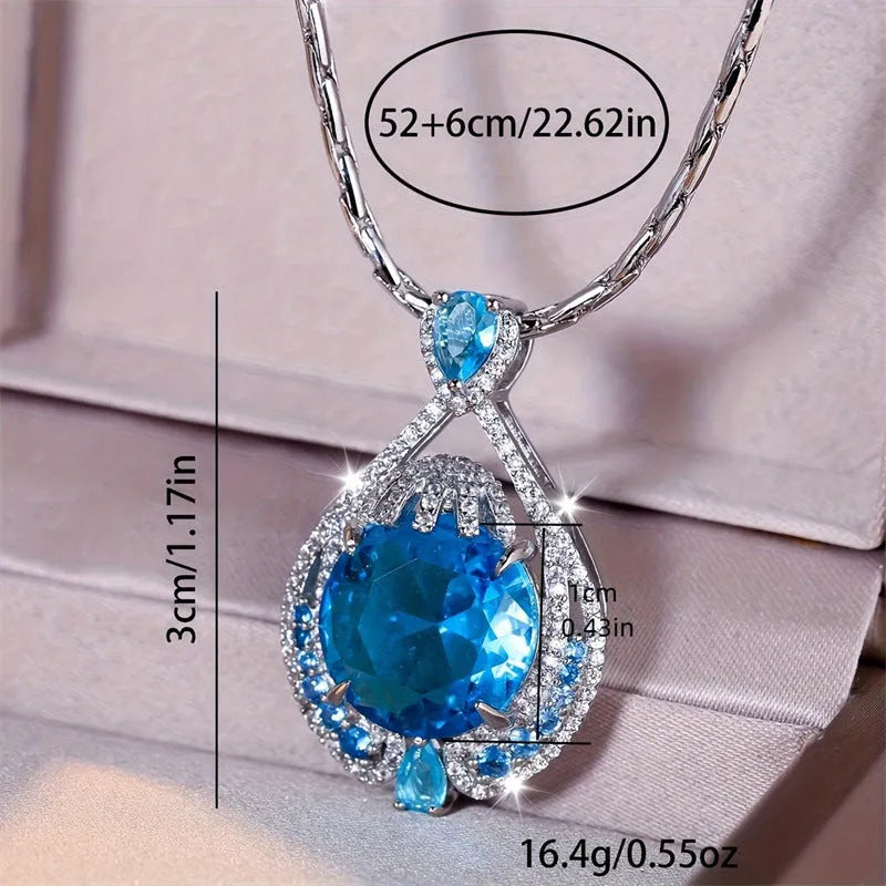 Women's geometric necklace with blue crystal gems on water wave chain