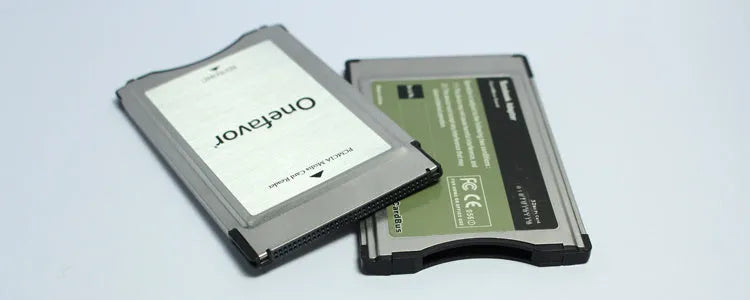 SD to PCMCIA adapter card with 32GB memory for Mercedes-Benz cars, showing stainless steel housing.