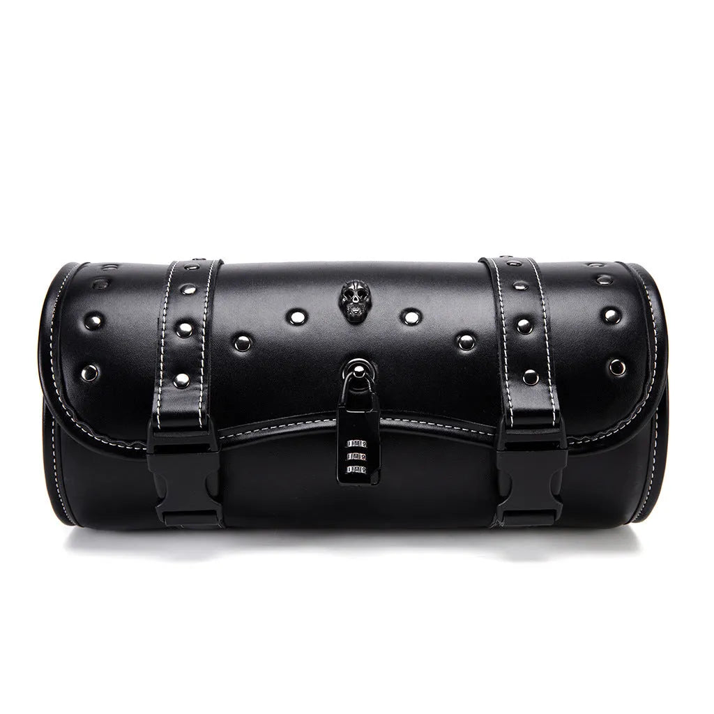 Black PU motorcycle pannier bag with punk retro styling mounted on a bike.