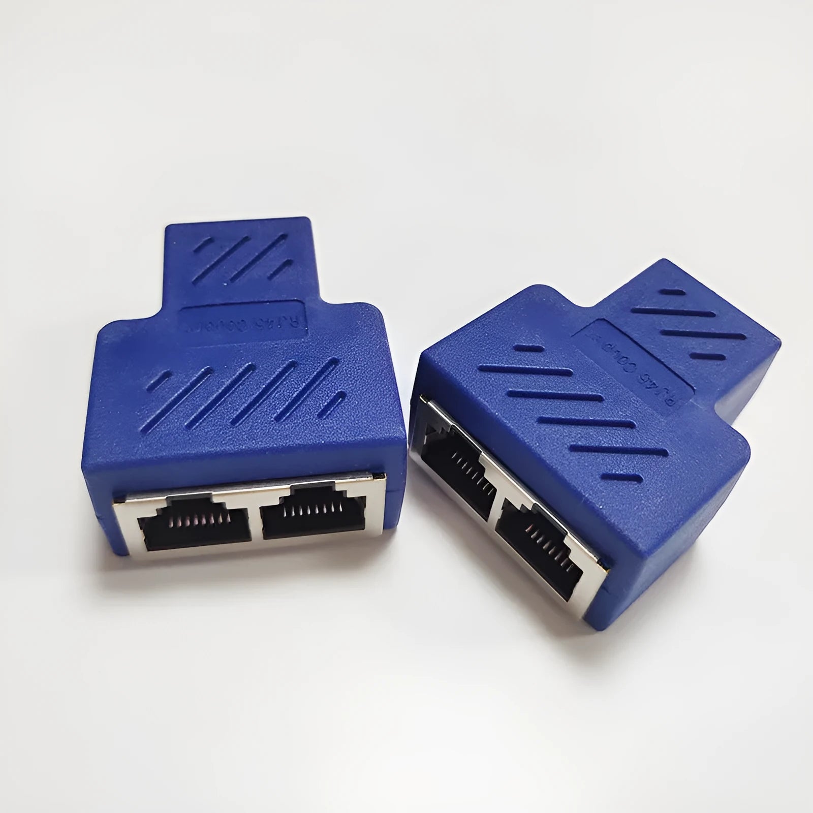 RJ45 network tee splitter adapter in multiple colours, showing one input and two output ports.