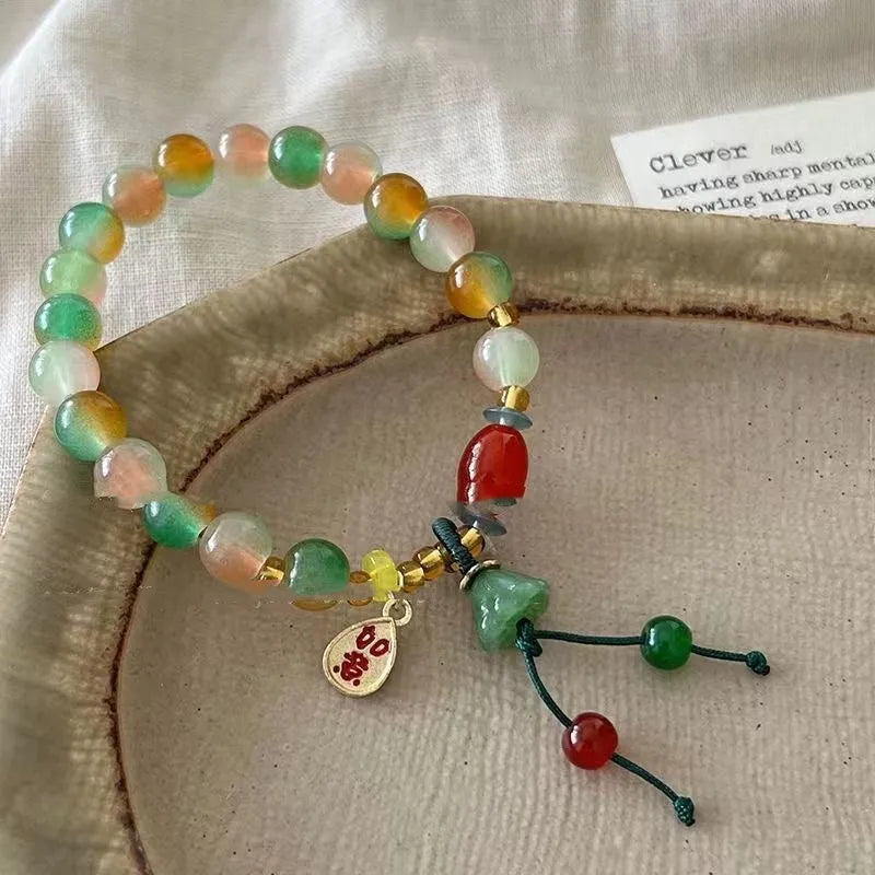 M990 Lotus Ruyi bracelet with mixed materials and lotus element