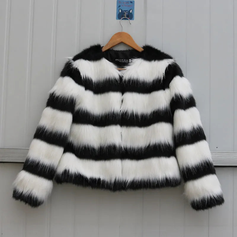 Women's black and white striped faux fur leather jacket with regular sleeves.
