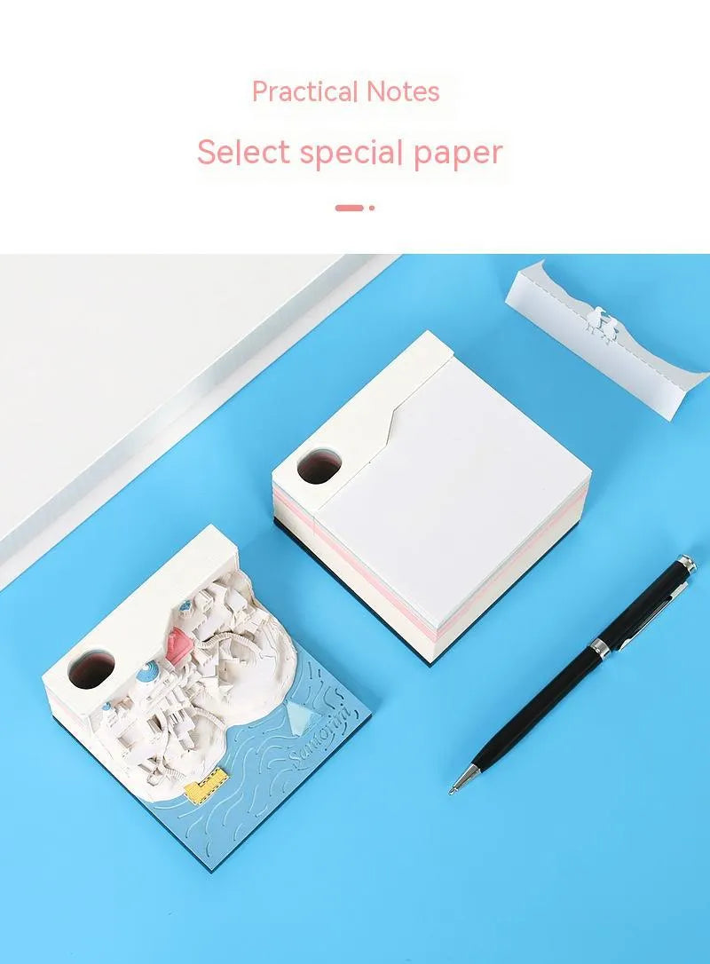 Illuminated 3D paper carving model of Santorini beach with integrated notepad
