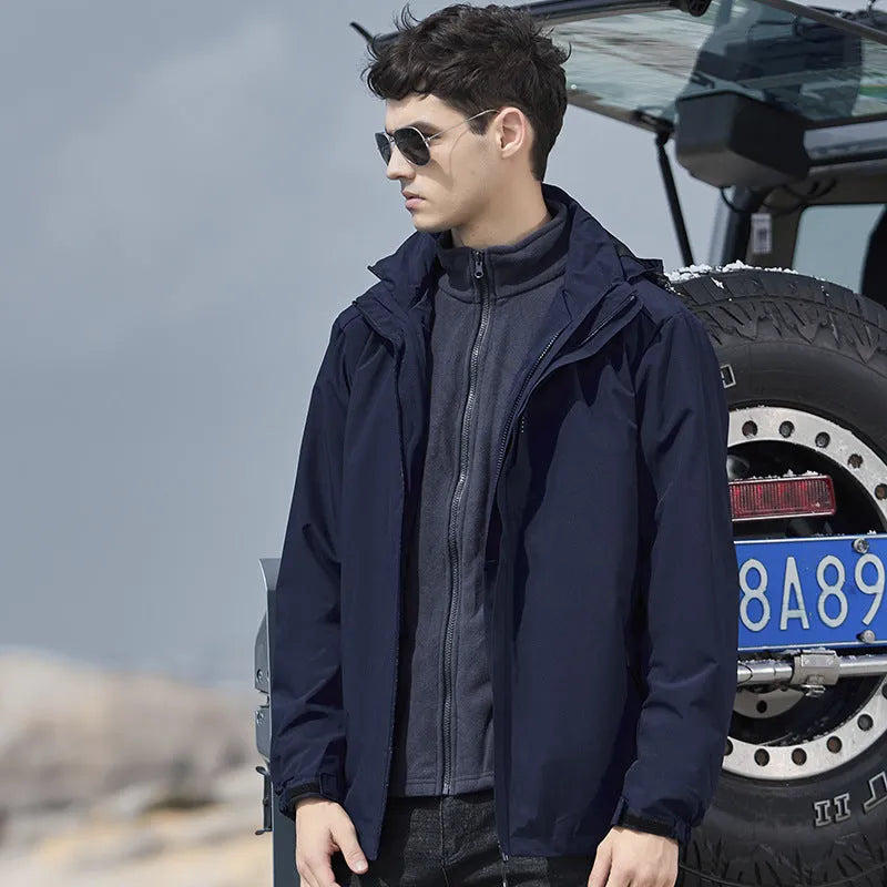Men's black waterproof mountaineering jacket and trouser set with removable fleece lining