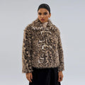 Women's leopard print fashion coat with a buckle lapel on the collar.