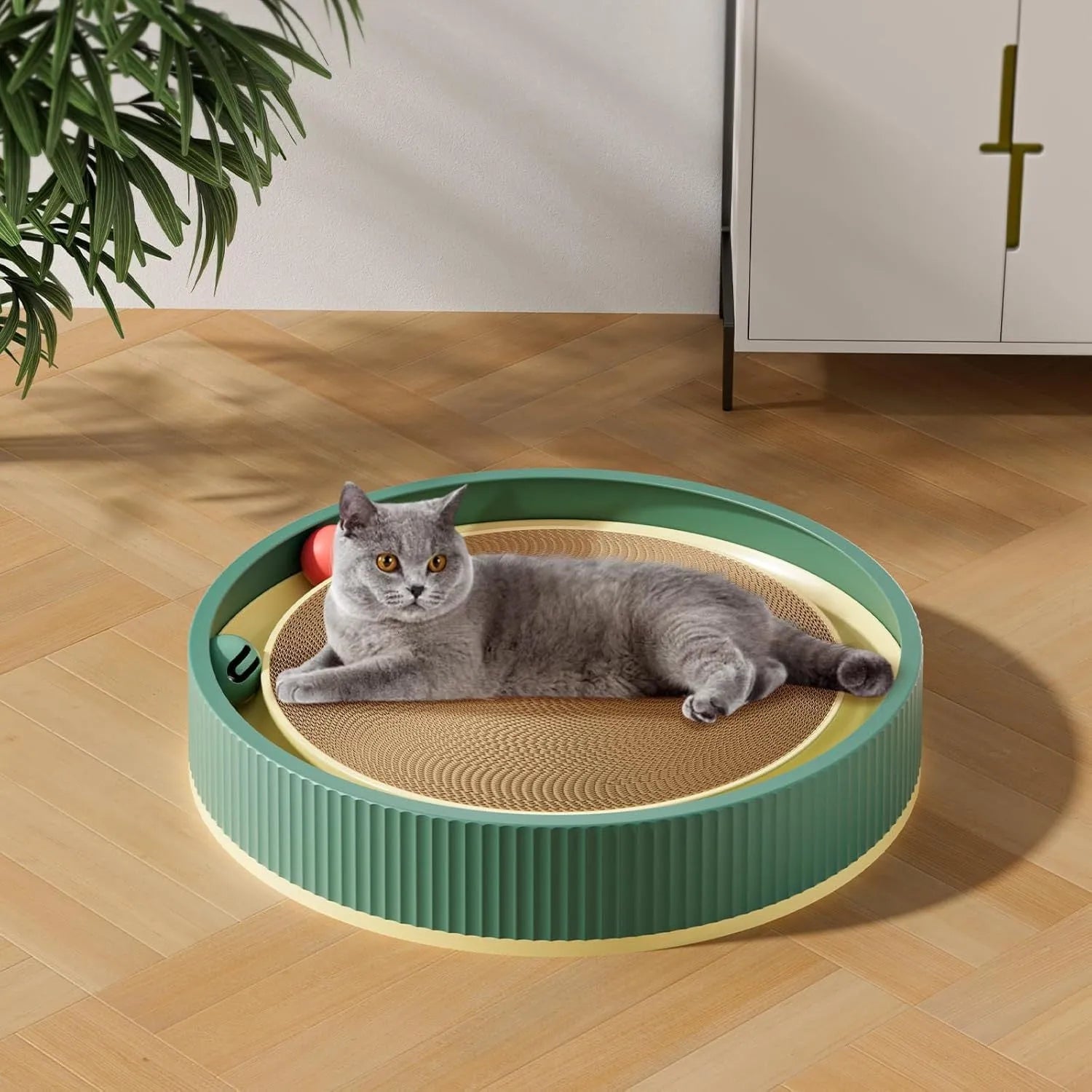 Large green cat scratching board with moving balls and spring plush toy, 45cm diameter
