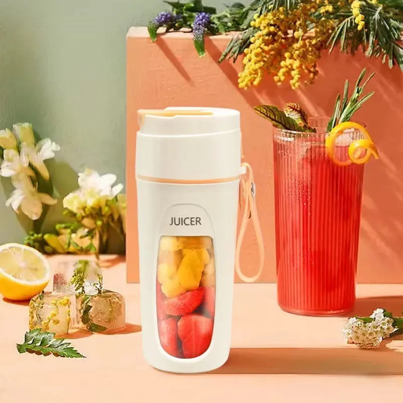 Portable USB rechargeable blender and juicer cup with borosilicate glass liner in fresh orange colour