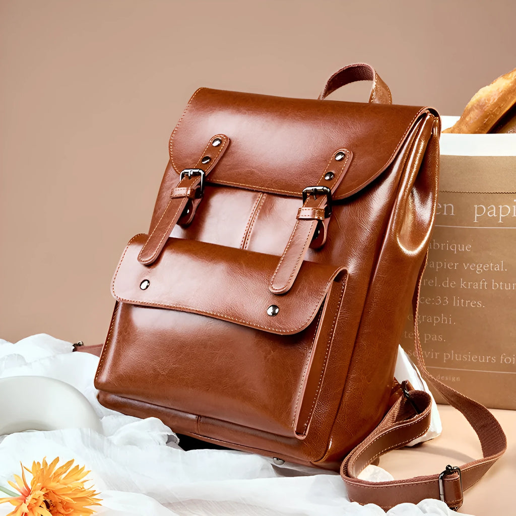 Women's leather computer backpack in black, brown, or coffee made from two-layer cowhide.