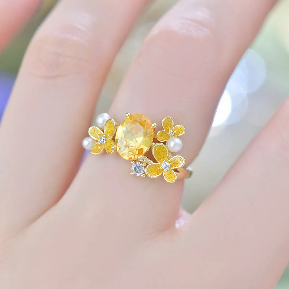 Women's flower pearl open ring with zircon stones in light purple colour