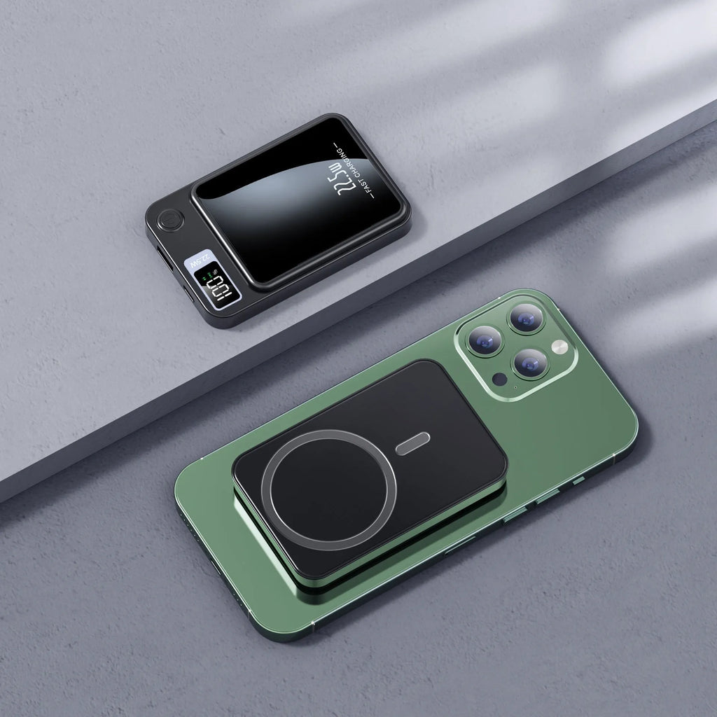 Wireless Magsafe power bank in black with compact industrial design showing charging surface