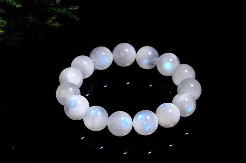 Natural blue moonlight round bead moonstone bracelet in white colour showing polished geometry-shaped beads